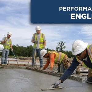 Multi-racial concrete flatwork crew finishing a freshly placed concrete slab during a hands-on performance exam.