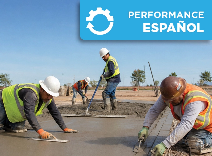 Latino concrete flatwork finisher smoothing freshly placed concrete during a performance exam.